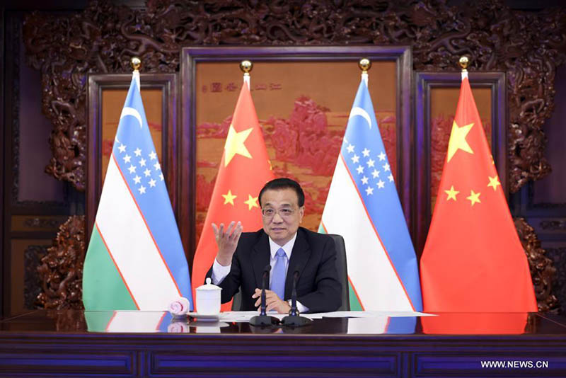 الصين تتعهد بتعزيز العلاقات مع أوزبكستان